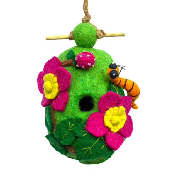 Colorful felt birdhouse with flowers