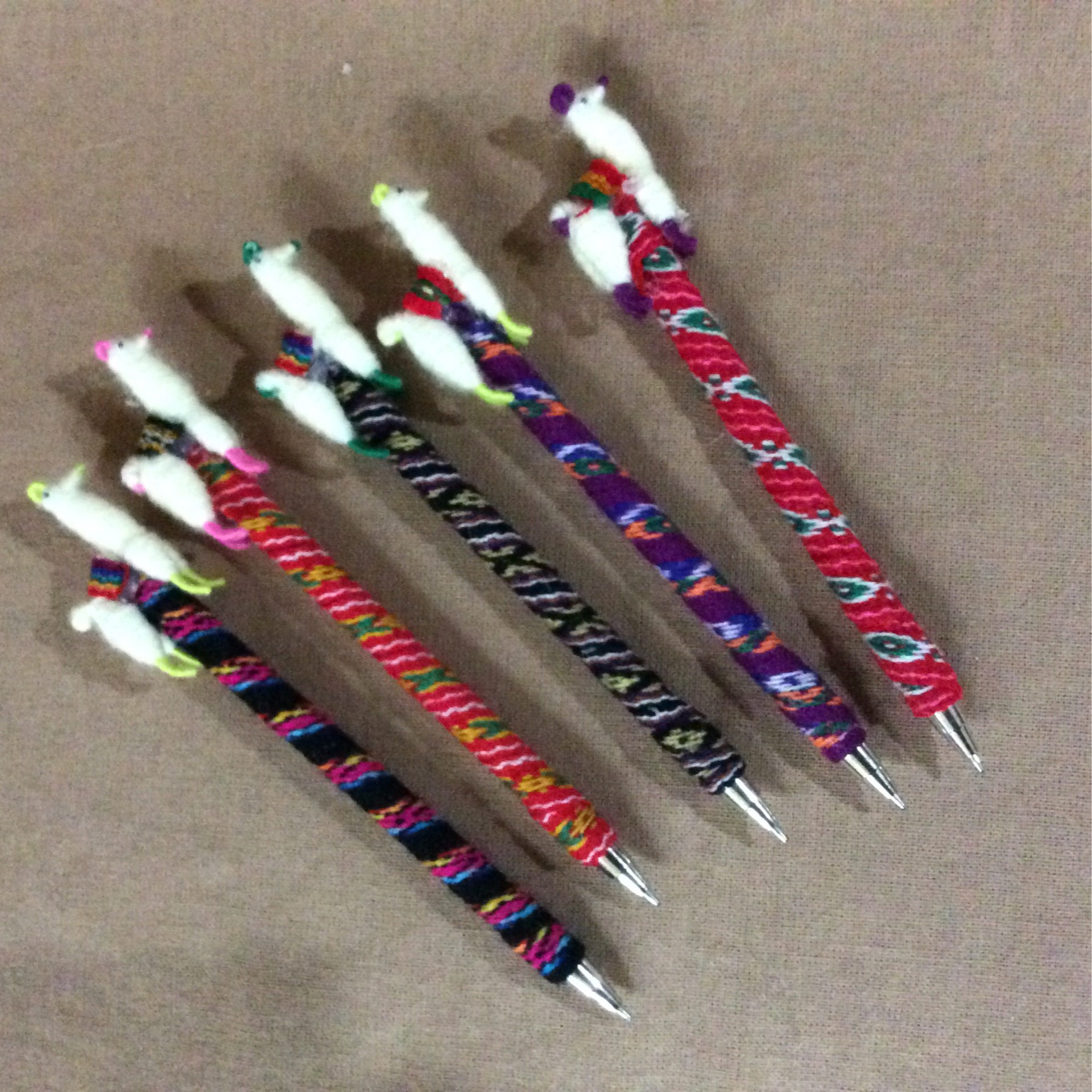 children pen white alpaca on top