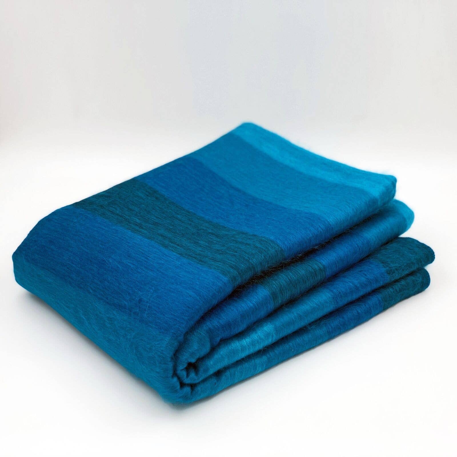 alpaca blanket turquoise folded