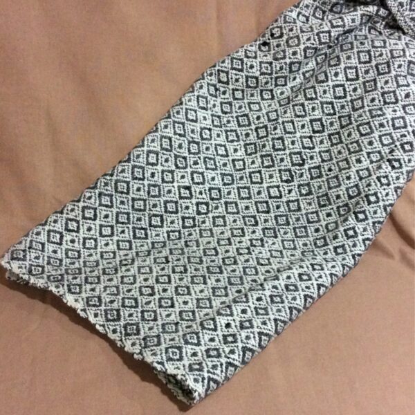alpaca hand made blanket folded gray and white